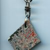 Fordite Keychain - 27.24mm x 24.33mm x 5.5mm          (2645)