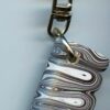 Fordite Keychain - 28.24mm x 20.04mm x 6.84mm          (2779)