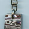 Fordite Keychain - 22.66mm x 19.86mm x 9.7mm          (2889)