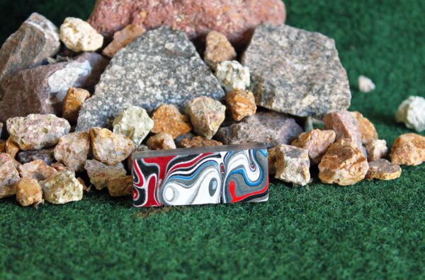 Finished Piece of Fordite -  Harley Davidson - 51.12mm x 20mm x 11.64mm          (2925)