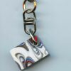 Fordite Keychain - Harley Davidson - 22.11mm x 16.7mm x 7.72mm          (3023) - Image 2