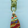 Fordite Keychain - Premium Fordite - 23.42mm x 15.12mm x 11.25mm          (3057)
