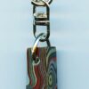 Fordite Keychain - Military Fordite - 23.02mm x 11.45mm x 8.53mm          (3113)